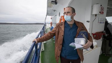 Health worker Gavin Chestnutt travelling to Rathlin Island, Northern Ireland, to provide vaccinations